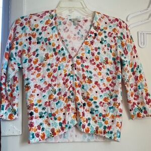 Flowered patterned blouse.